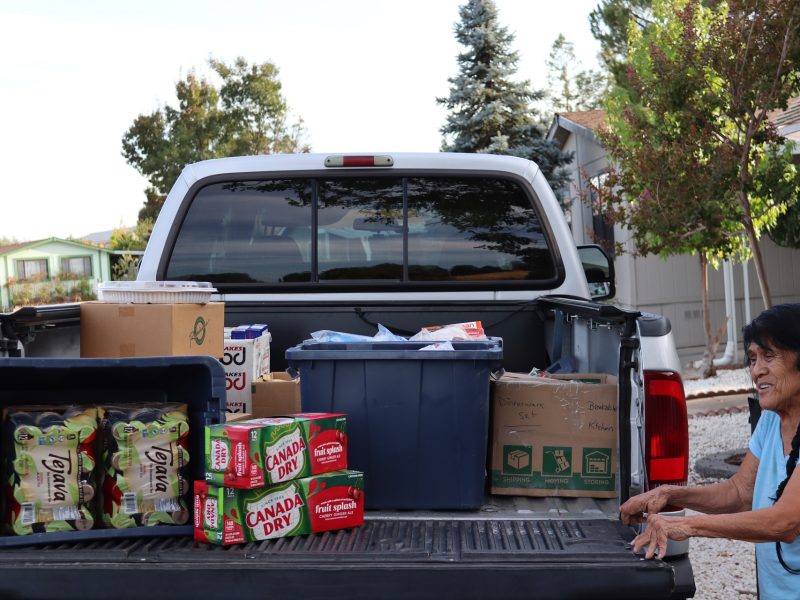 Plenty of food with tea and sodas with our Program Director pictured.