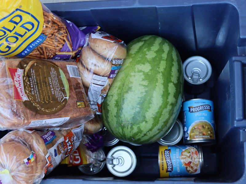 Various breads, fruits, snacks, and soups.