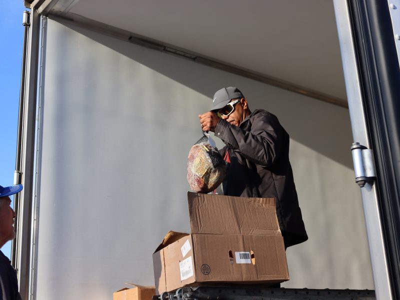 Ronald Buckman showing just one of the extras being added to distributions for tribal families.