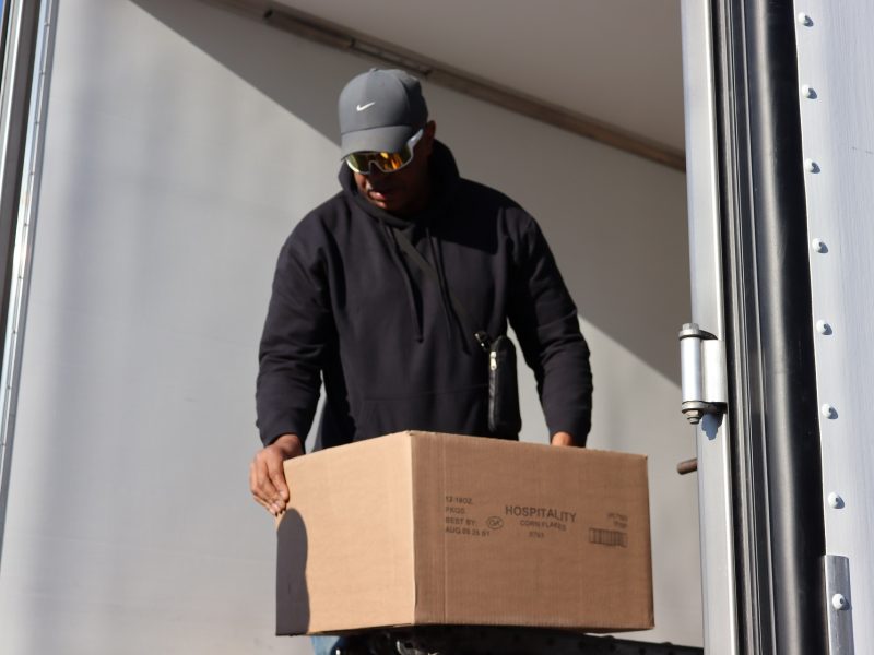 Beginning of first distribution Assistant Director Ronald Buckman pictured.