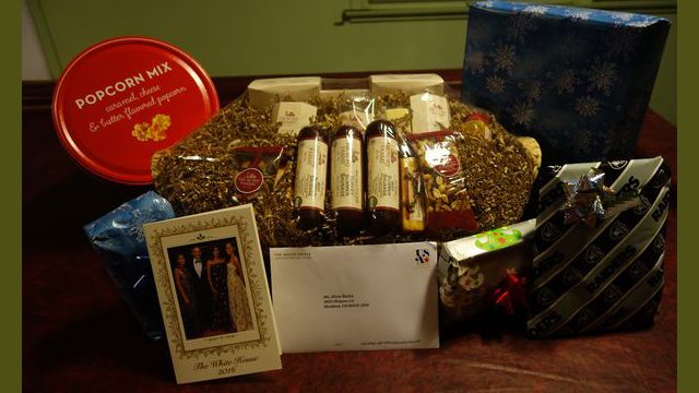 Pictured here are a few of the gifts sent by tribes / Indian organizations to the California Valley Miwok Tribe in celebration of this festive season.nnCenter piece gift basket was sent by the Jackson Rancheria, surrounded by some of the gifts also sent by various tribes and tribal affiliates. Foreground shows Christmas card sent by the White House.