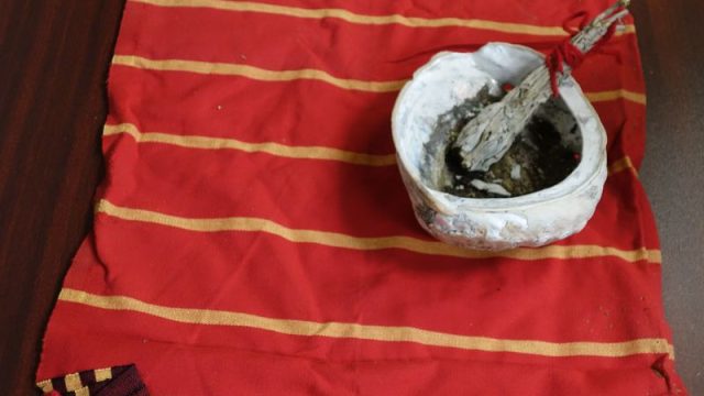 Pictured here are just some of the items brought to the event by Tribal Sweat Leader and Spiritualist Daryl Burley. Notice the clam shell and sage, which were used by Daryl Burley in “smudging” himself and other tribal representatives before the opening of the event.
